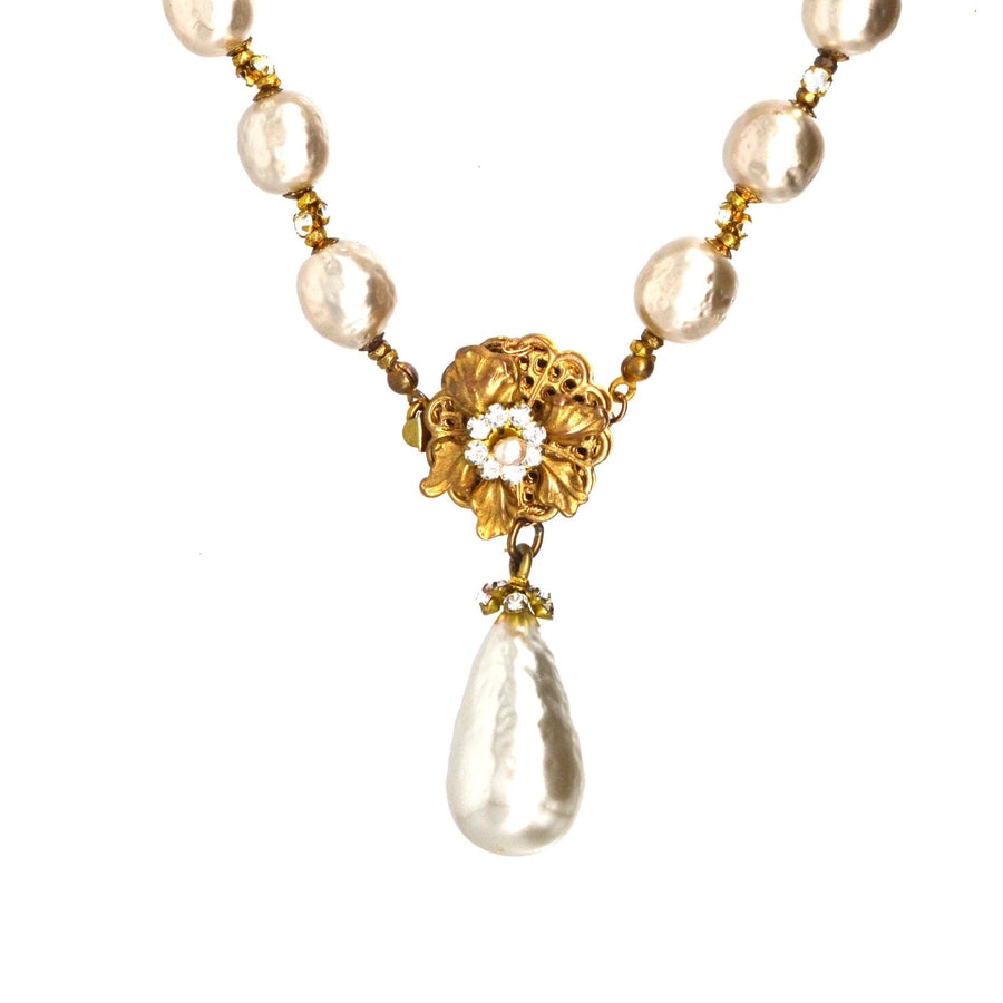 1960s Miriam Haskell faux pearl necklace with floral gold clasp and large drop pearl pendant.