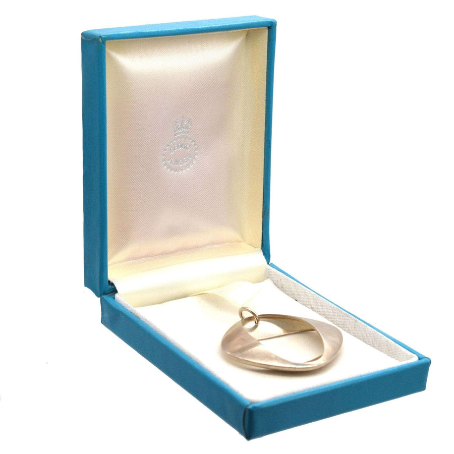 1960s silver modernist pendant by Henning Koppel for Georg Jensen in original blue case.