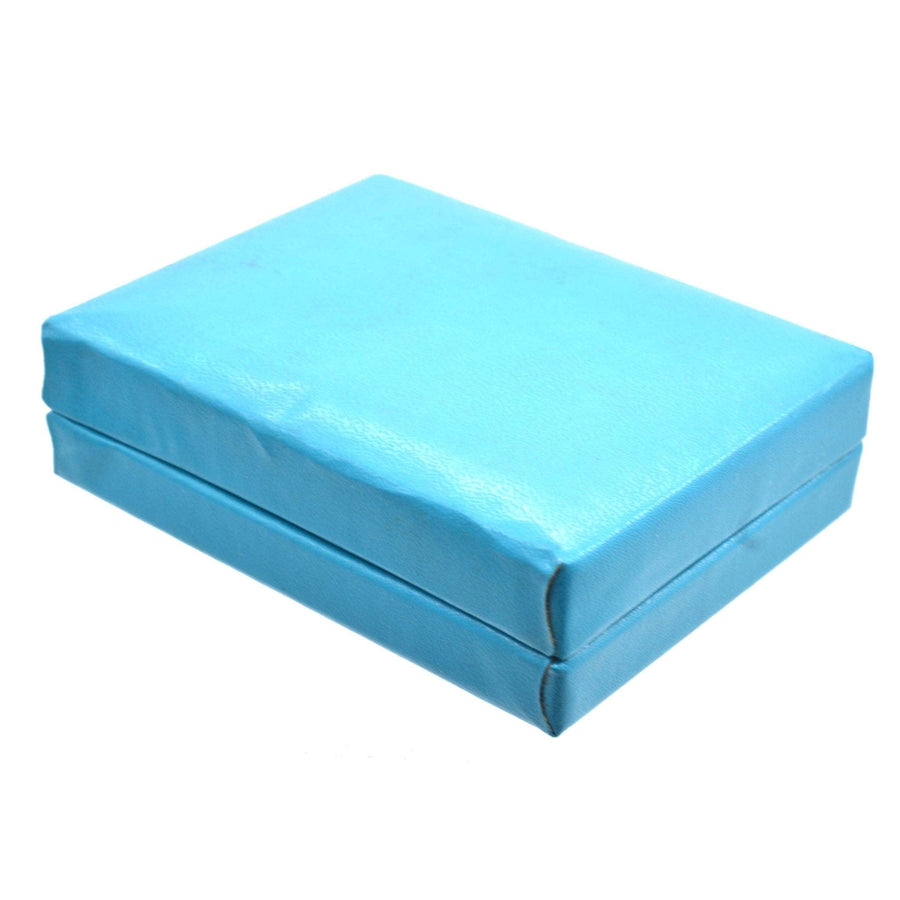 Light blue gift box for jewelry, perfect for presenting a pendant or modernist jewelry piece.