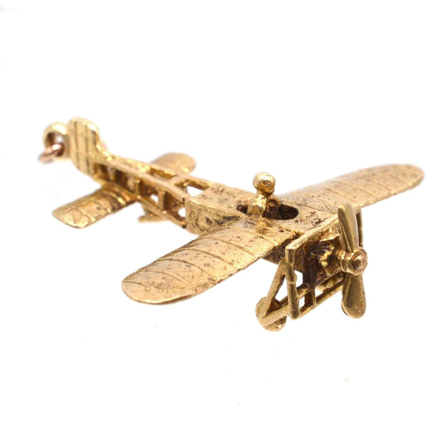 1970s 9ct gold vintage Aerolane pendant charm with spinning propeller and intricate detailing.