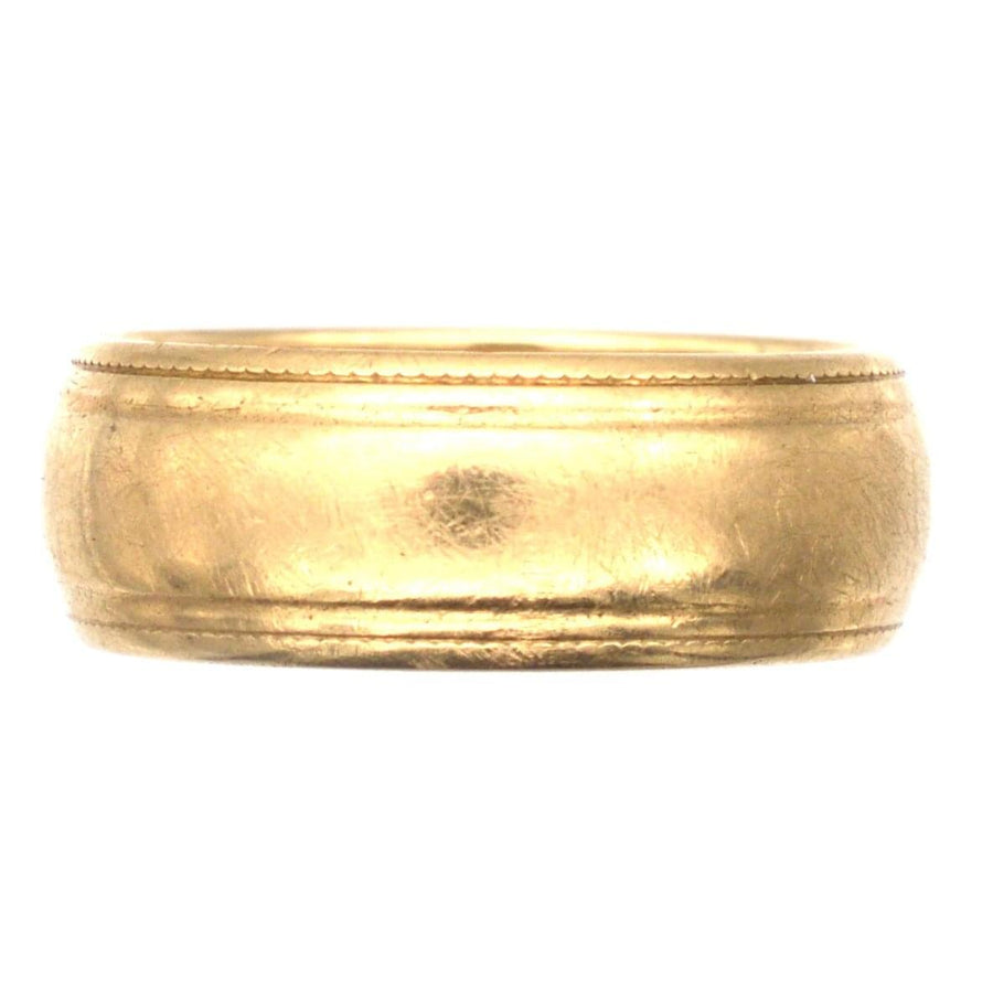 1970s 9ct gold wedding ring with decorated edge, 6.7mm width, fully hallmarked from London, ideal for weddings.