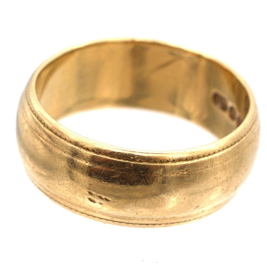 1970s 9ct gold wedding ring with decorated edge, hallmarked London, elegant design, 6.7mm width, perfect for weddings.