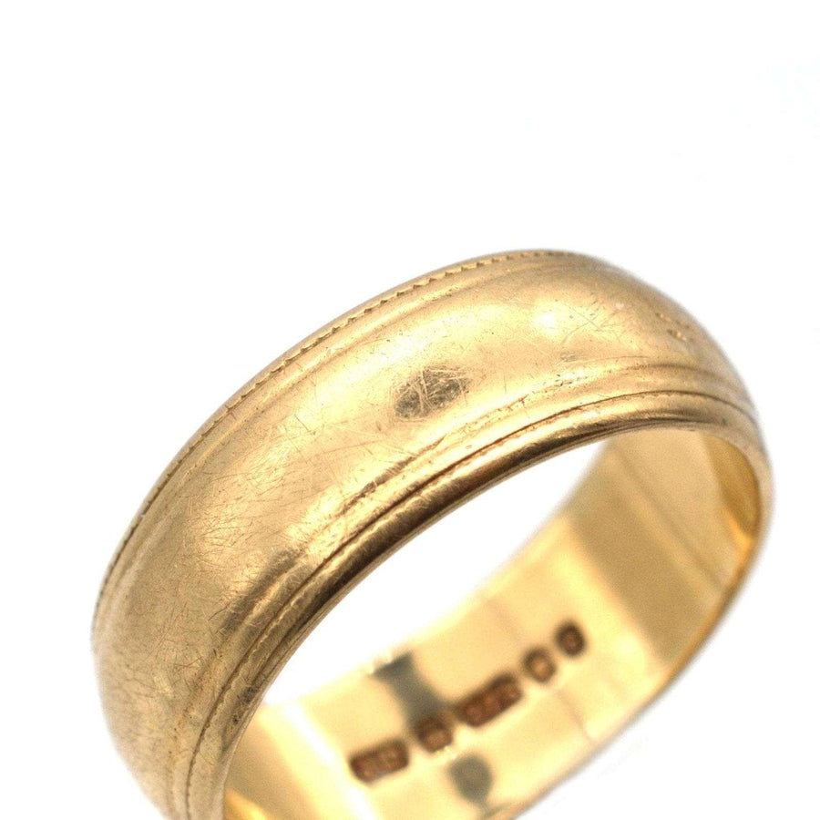1970s 9ct gold wedding ring with decorated edges and full hallmark, a perfect choice for a wedding band.