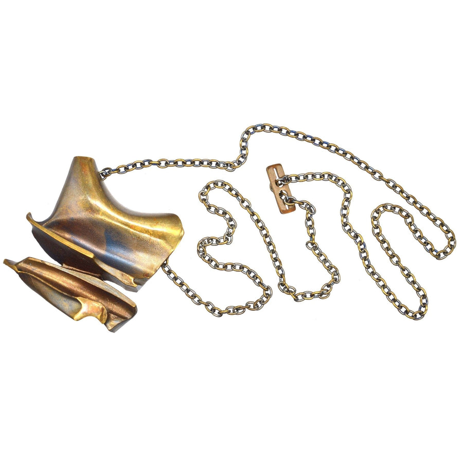 1970s Lapponia Daytona Flame Bronze pendant brooch by Bjorn Weckstrom with chain, featuring a unique industrial design.