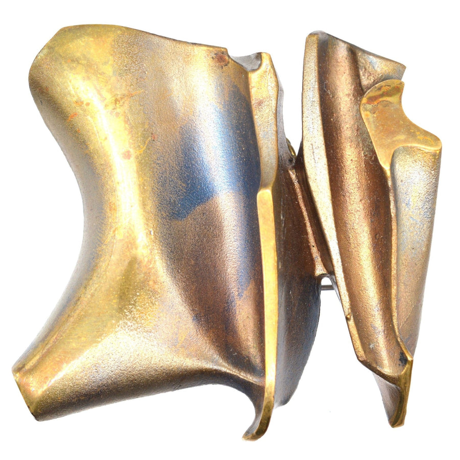 1970s ‘Daytona’ Flame Bronze pendant brooch by Bjorn Weckstrom for Lapponia, showcasing brutalist design and unique metal finish.
