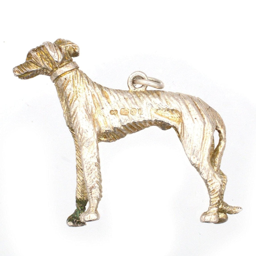 1970s solid silver dog pendant featuring a whippet design, made in London, perfect gift for dog lovers.
