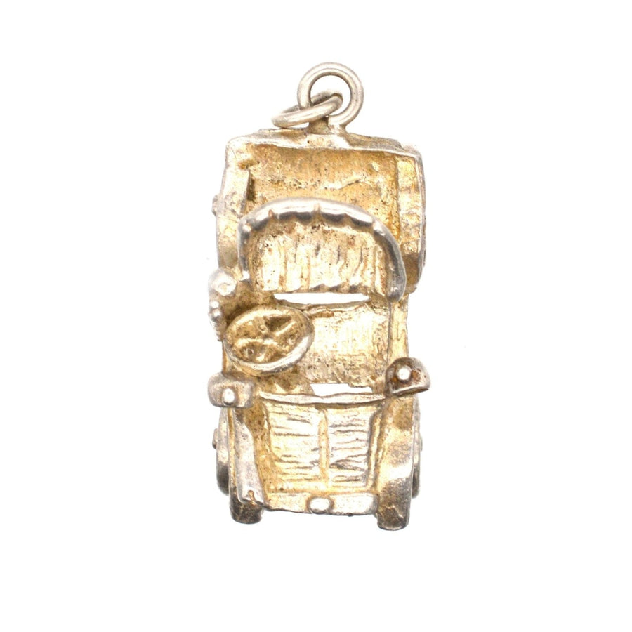 Vintage car charm pendant in silver with moving wheels, perfect for collectors and charm bracelet lovers.