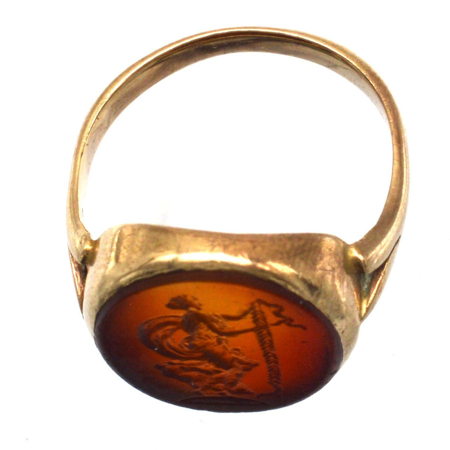19th century 9ct gold ring featuring carnelian intaglio of goddess Nike, symbolizing victory and elegance.