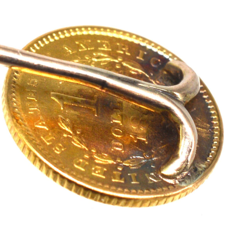 19th Century American Gold 1851 $1 Dollar Coin with Liberty Head Tie Pin on a golden dollar coin