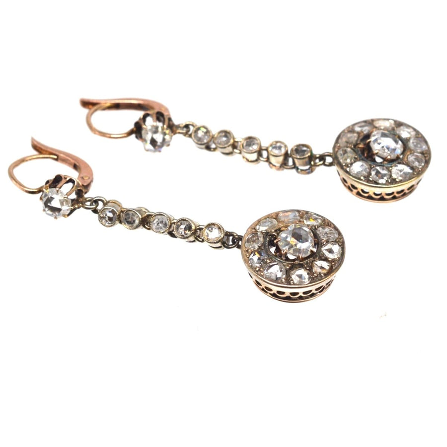 19th Century French 18ct gold rose cut diamond earrings with sparkling clusters and dangling stones.