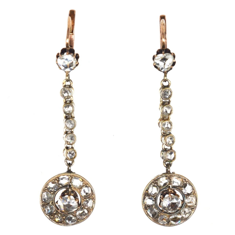 19th century gold earrings with rose cut diamonds, featuring a dramatic drop and exquisite cluster design.