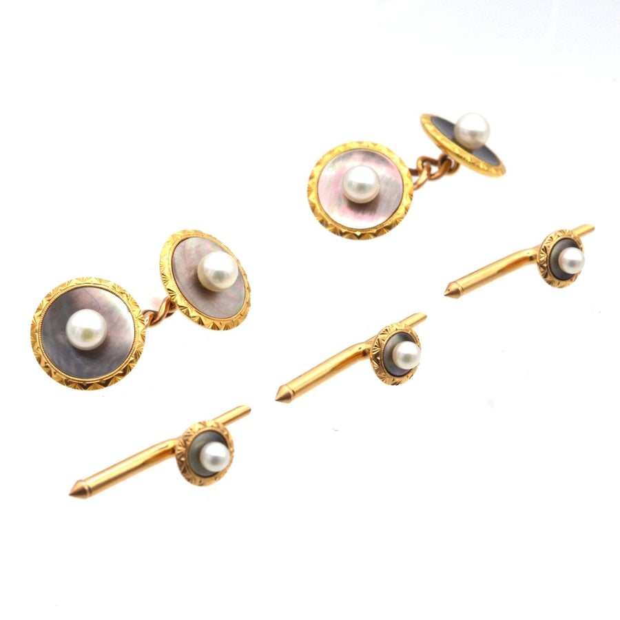 Art Deco 14ct gold dress set with black mother of pearl cufflinks and studs featuring decorative pearls.