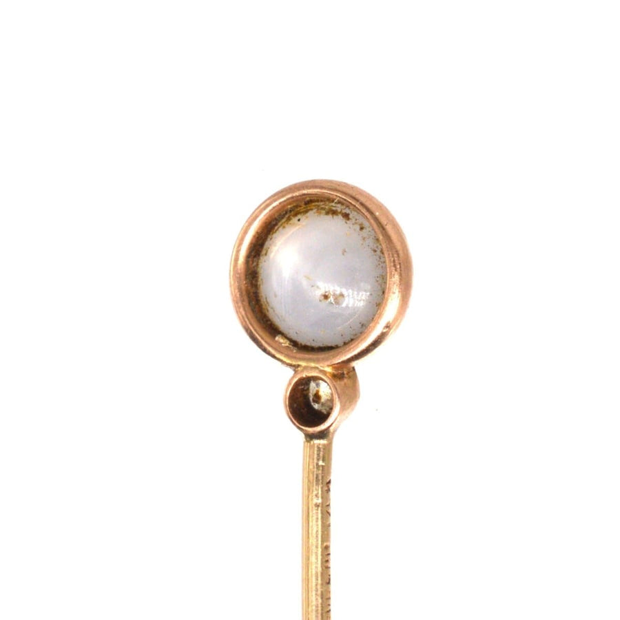 Art Deco 14ct gold star sapphire tie pin featuring a grey-blue cabochon and sparkling diamond by Shreve & Co.