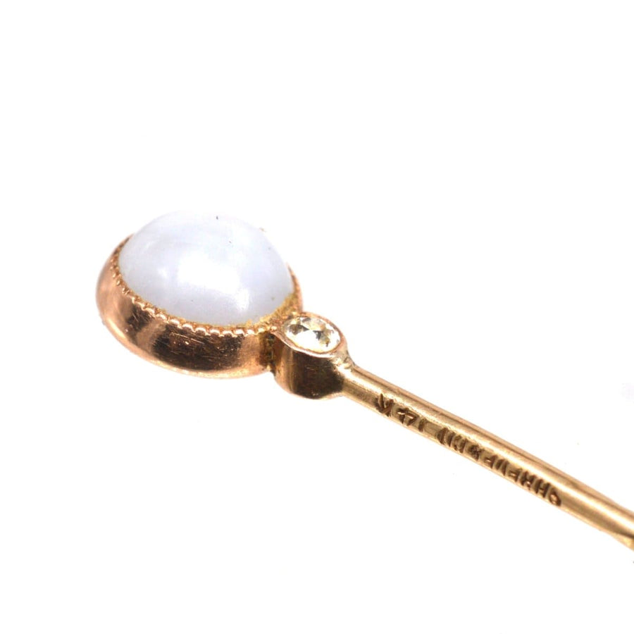 Art Deco 14ct gold tie pin featuring a star sapphire cabochon and diamond, by Shreve & Co.