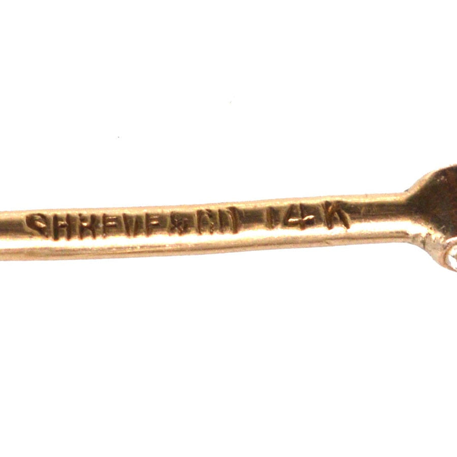 Art Deco 14ct gold tie pin by Shreve & Co. showing maker's mark and 14K gold certification.