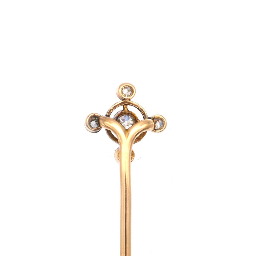 Art Deco 15ct gold and diamond circular tie pin featuring 0.30 carats of diamonds with elegant design.