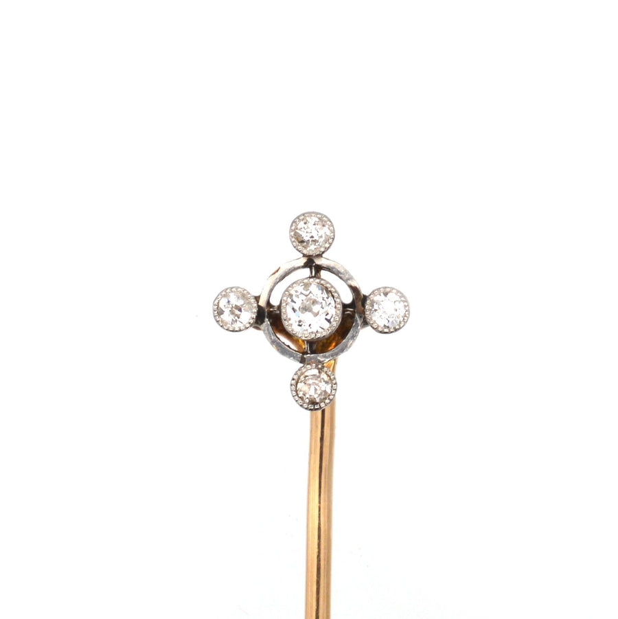 Art Deco 15ct gold and diamond circular tie pin featuring 0.30 carats of diamonds and a sleek platinum design.