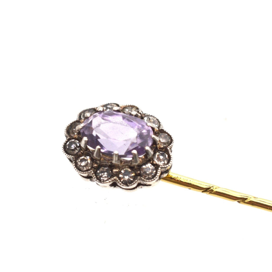Elegant Art Deco 18ct gold tie pin featuring amethyst and white paste cluster design, made between 1915-1925.
