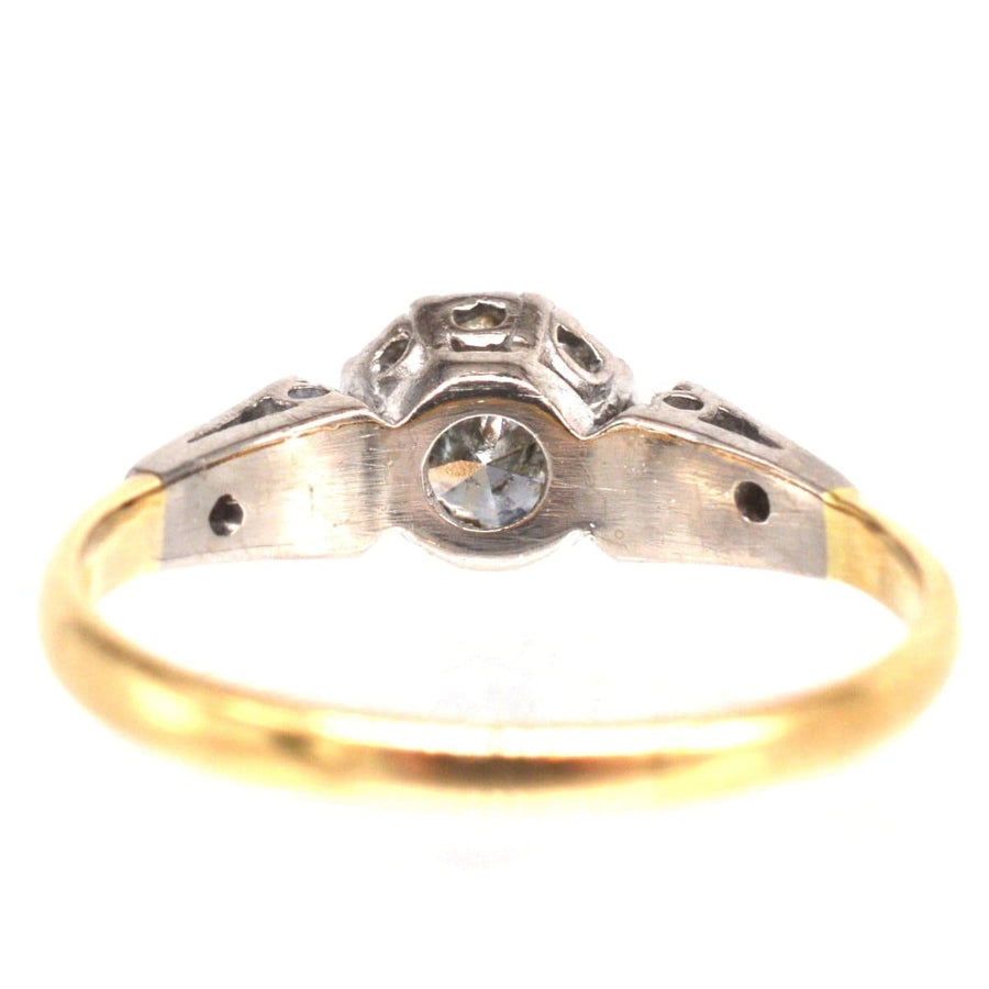 Art Deco 18ct gold and platinum diamond solitaire ring with shoulder diamonds, ideal for engagement.