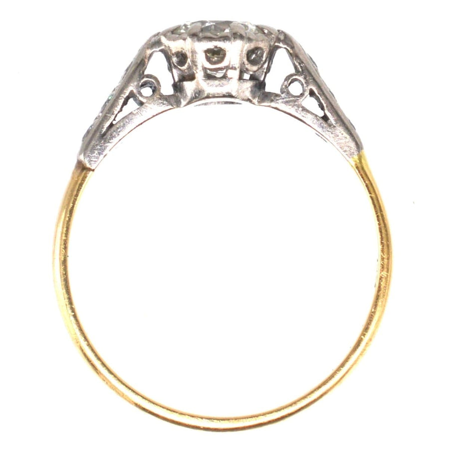 Art Deco 18ct gold and platinum diamond solitaire ring with diamond shoulders, featuring a 3/4 carat center stone.