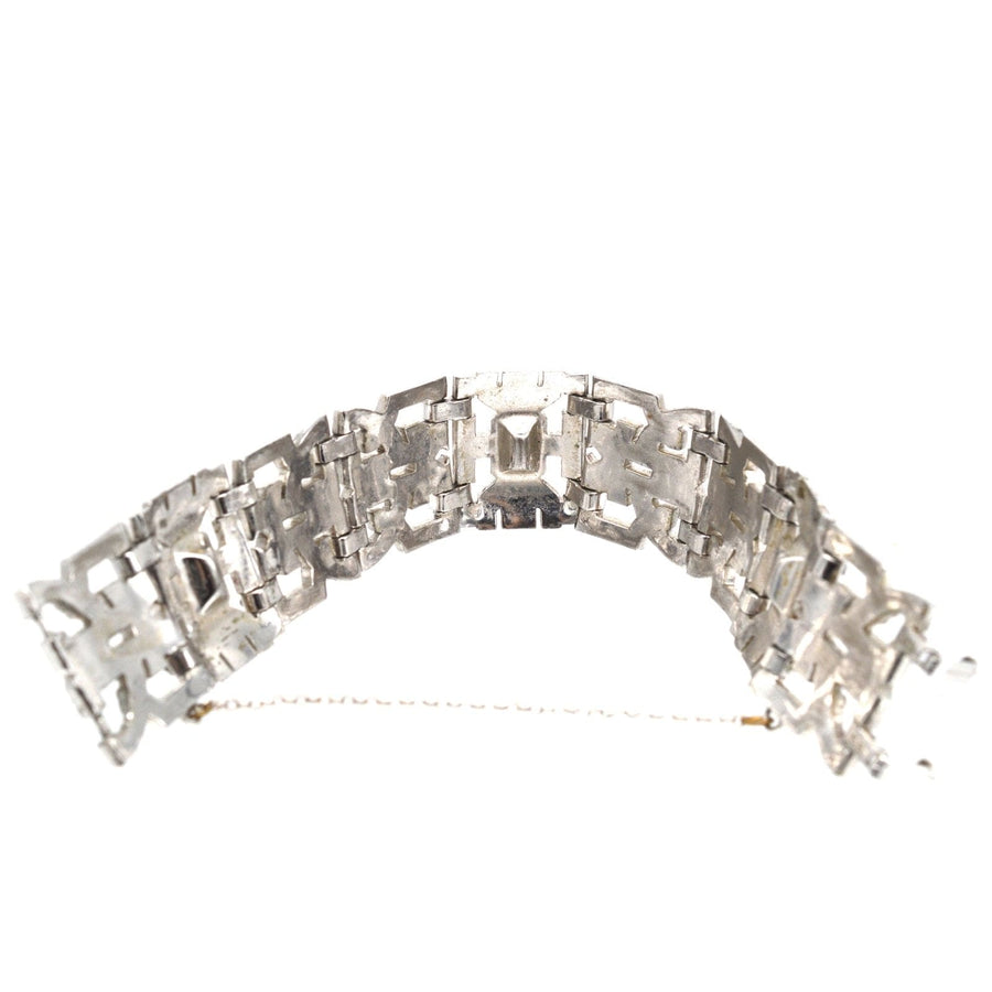 Art Deco chrome 'Diamond' paste bracelet showcasing bold, architectural design with wide diamond cuffs.