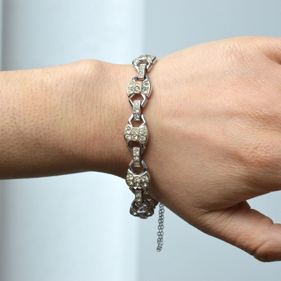 Stylish Art Deco chrome paste bracelet showcasing geometric shapes on a wrist.