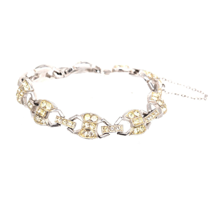 Art Deco chrome paste bracelet featuring geometric shapes and sparkling yellow stones, perfect for stylish occasions.