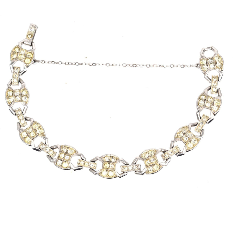 Art Deco chrome paste bracelet featuring geometric designs and sparkling yellow stones.