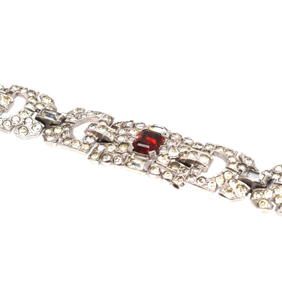 Art Deco chrome bracelet featuring white and red paste stones designed to mimic diamonds and rubies.