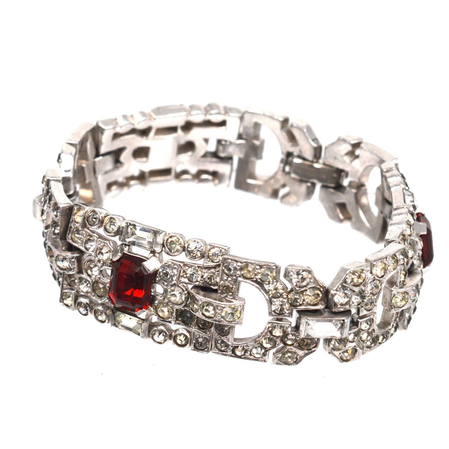 Art Deco chrome bracelet in white and red, featuring sparkling faux diamonds and rubies, designed to impress.
