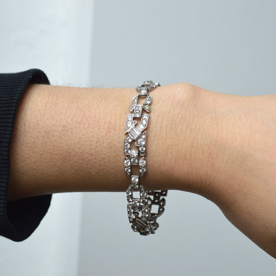 Art Deco Ciro silver paste bracelet showcasing elegant design and sparkling stones, worn on a wrist.