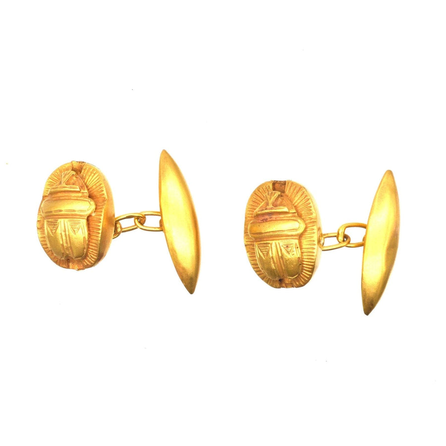 Art Deco Egyptian Revival 18ct gold scarab cufflinks featuring intricate detailing and a timeless design.