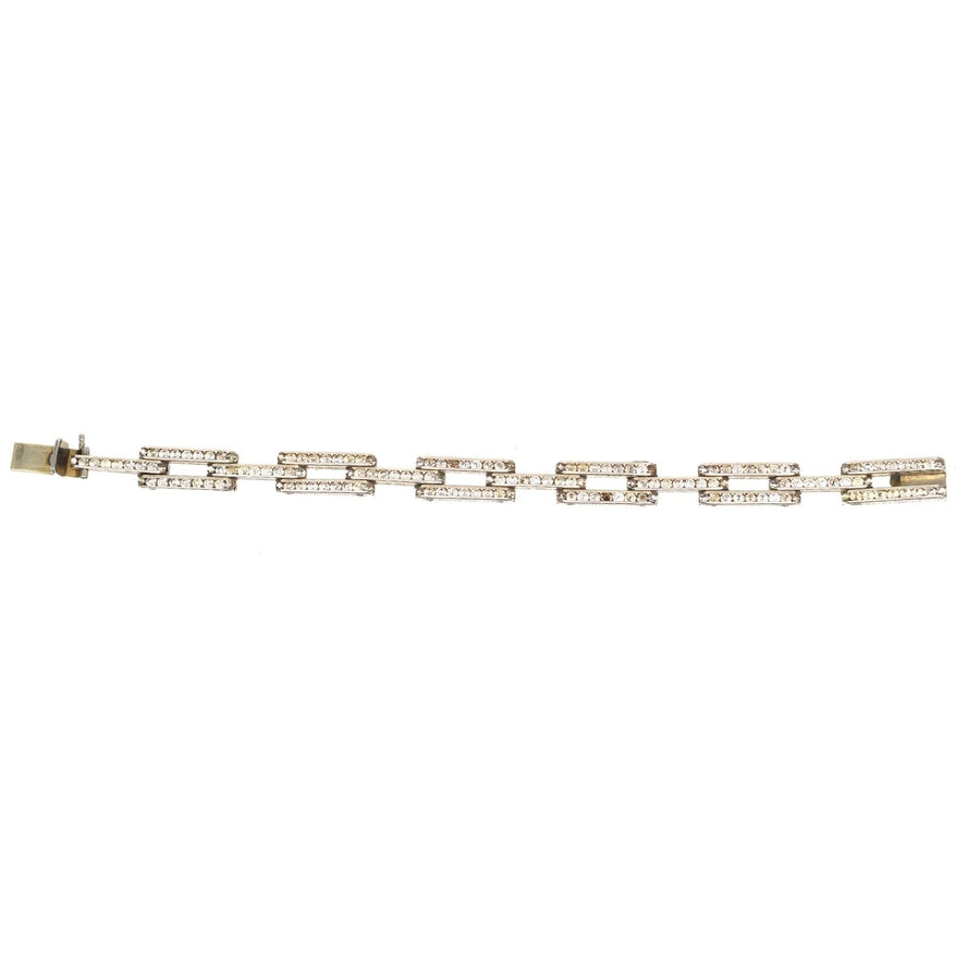 Art Deco German silver and white paste tank bracelet with geometric design, showcasing classic elegance and style.