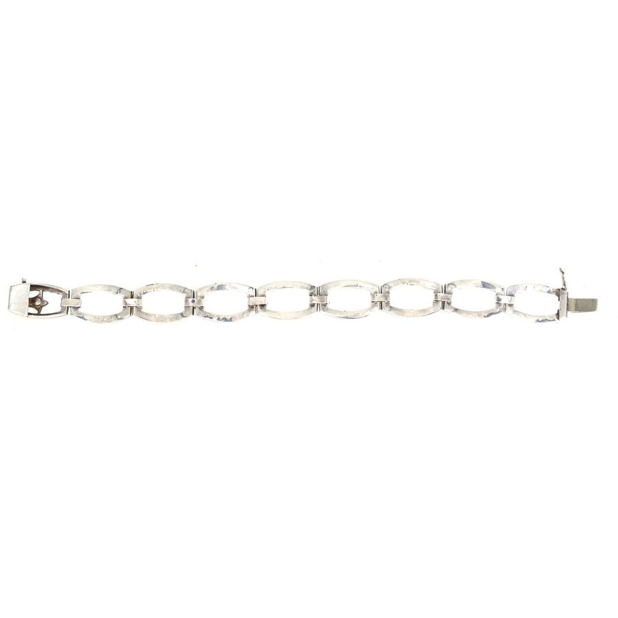 Art Deco green and white paste bracelet, elegant design resembling diamonds and emeralds, perfect for cocktail parties.