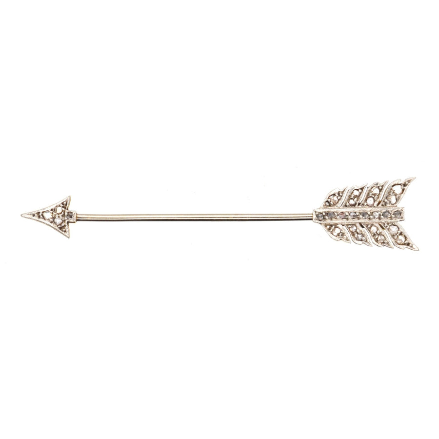 Art Deco diamond arrow jabot pin brooch in platinum and 18ct gold, symbolizing love and versatility in jewelry.