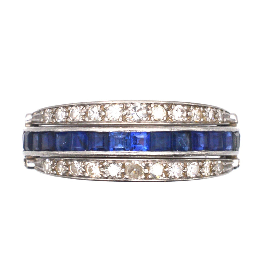 Art Deco flip-over ring featuring sparkling diamonds, sapphires, and a versatile design for day or night wear.