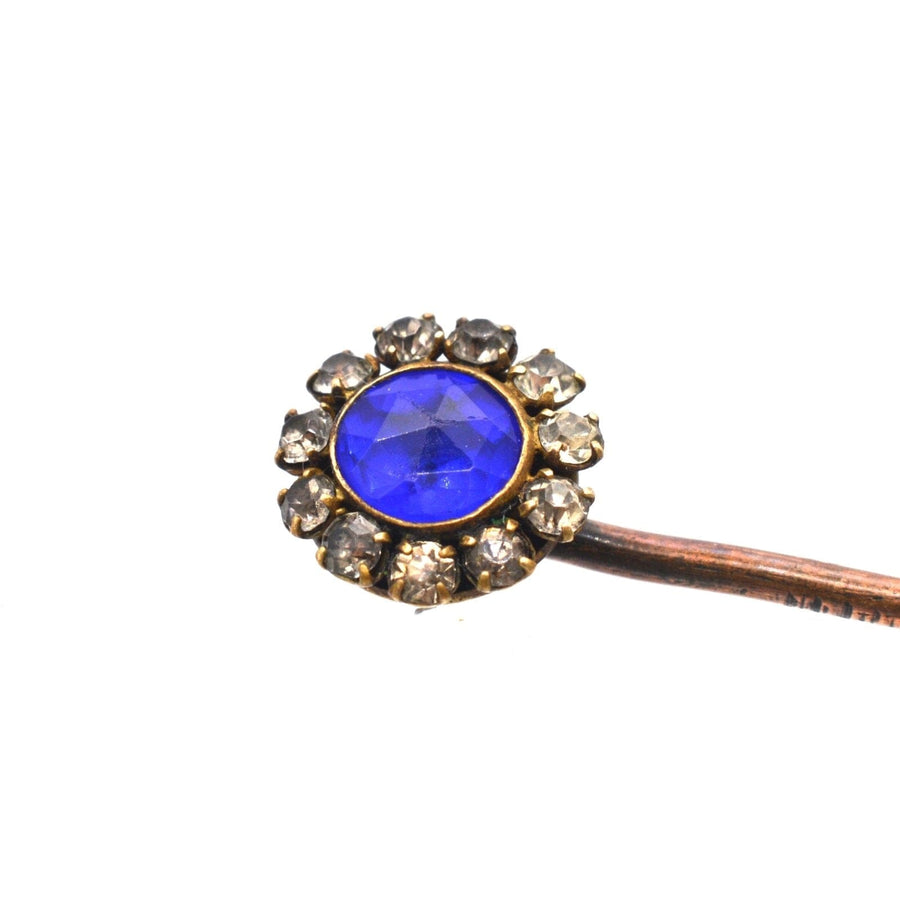 Art Deco blue sapphire and white paste tie pin with cobalt blue center and clear glass stones.