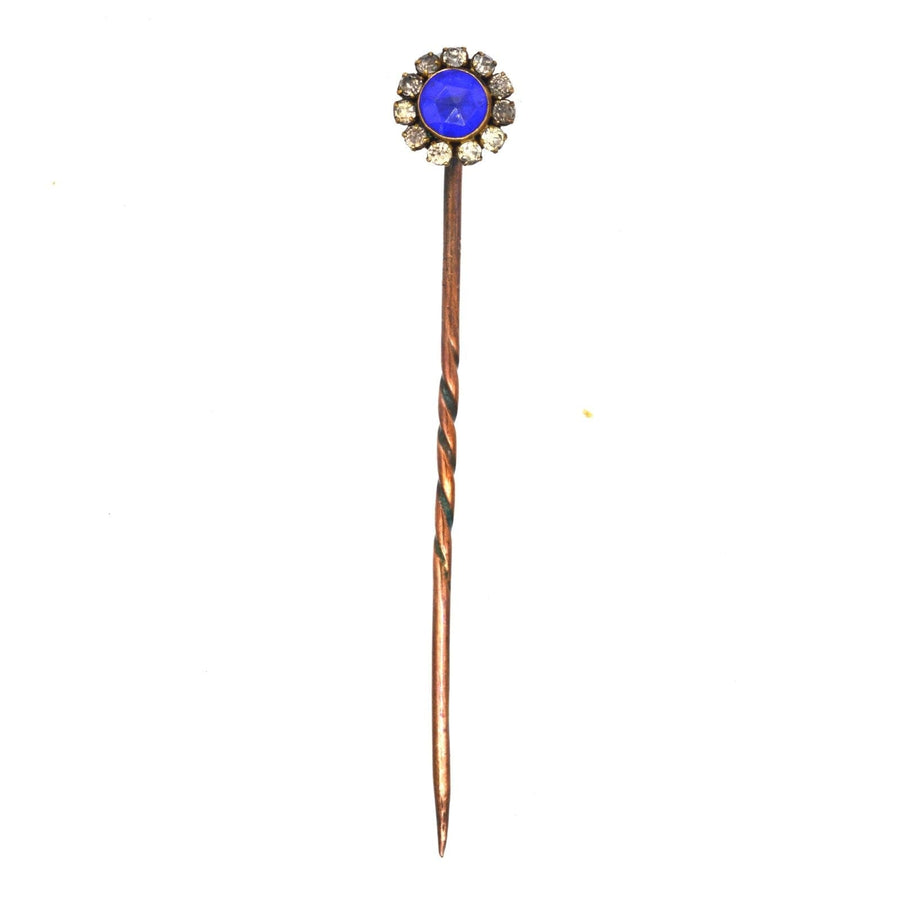 Art Deco rose cut blue sapphire and white paste tie pin with cobalt blue center and sparkling accents.