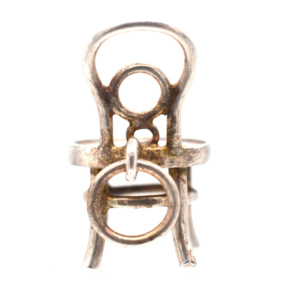 Art Deco silver bentwood Thonet French Bistro chair charm pendant with rattan seat, vintage style.