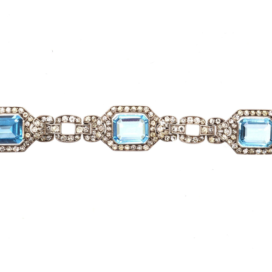 Art Deco silver bracelet with blue and white paste stones, capturing the elegance of the early 20th century.