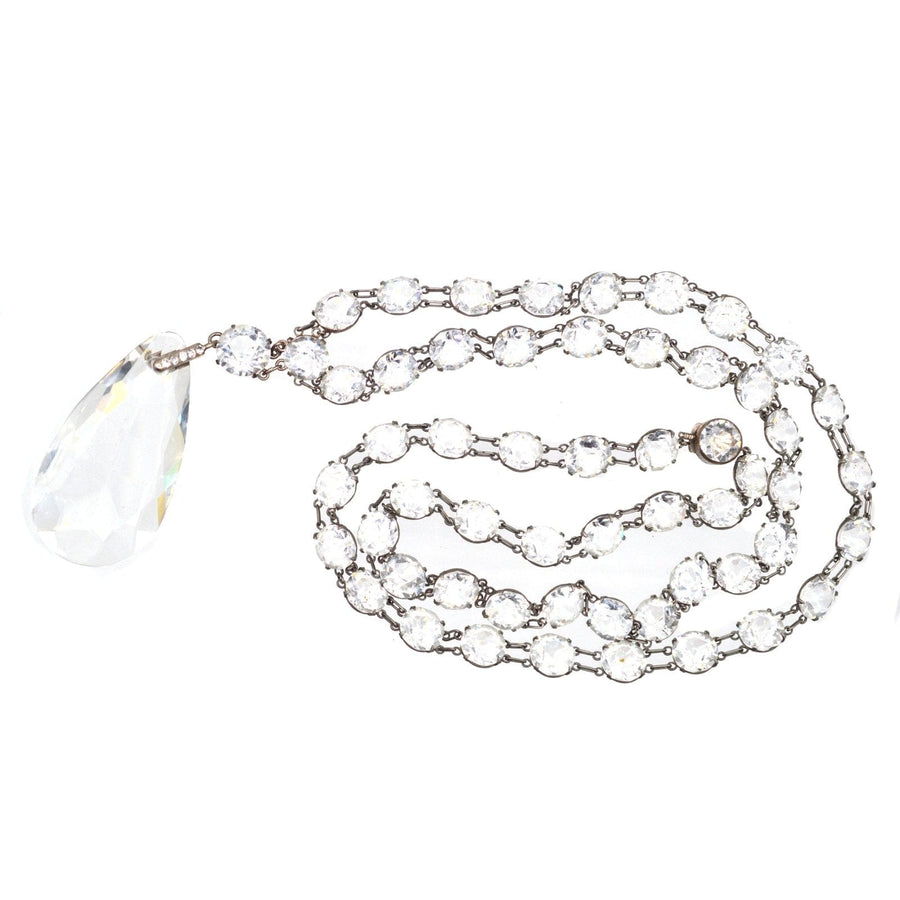 Art Deco silver necklace with white paste pendant, showcasing fine craftsmanship and stunning design.