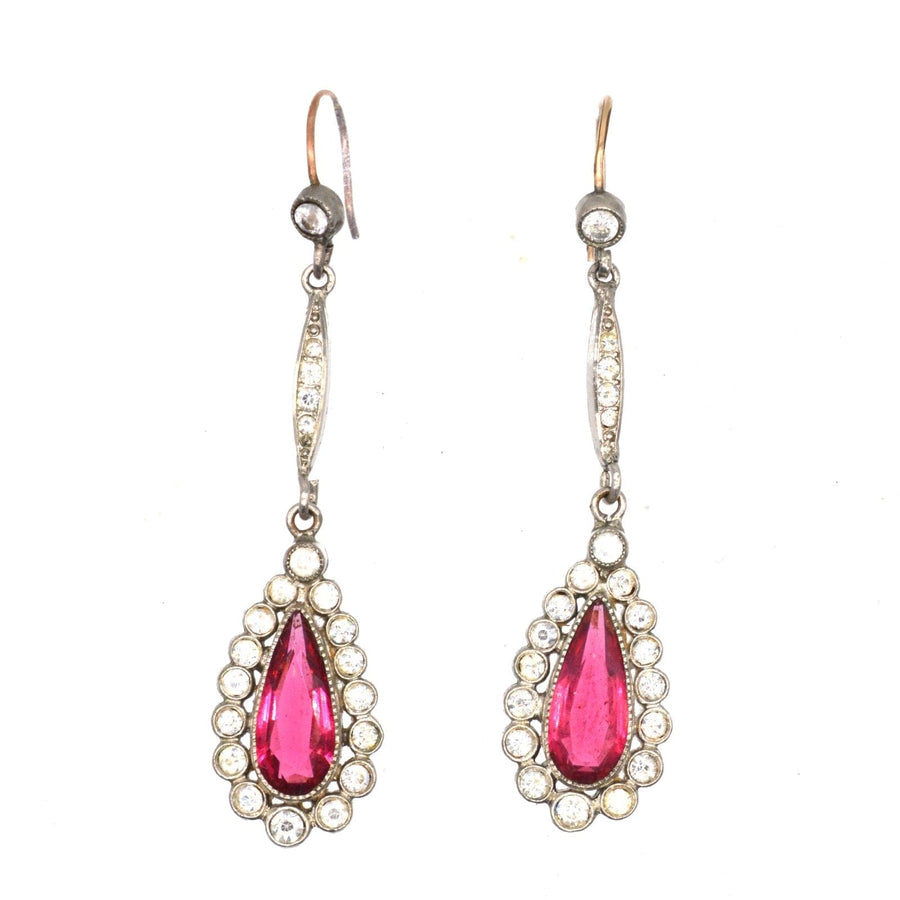 Art Deco silver-tone drop earrings with red 'ruby' paste in pear shape and crystal clusters, 1920s vintage style.