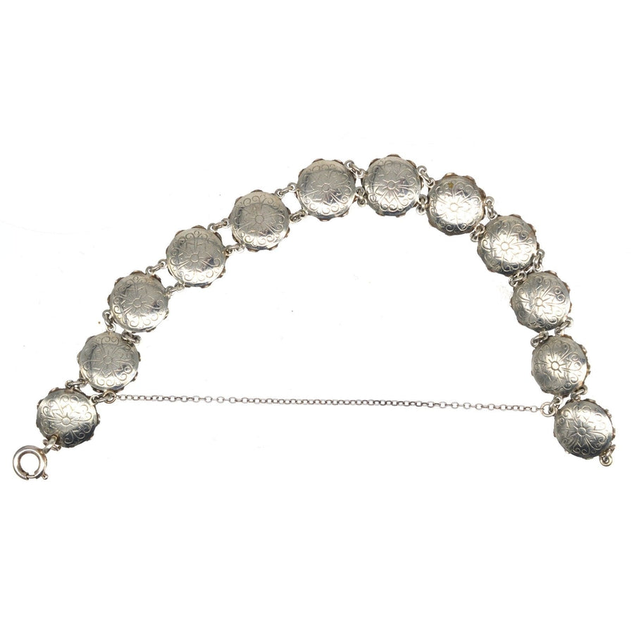 Art Deco silver bracelet with twelve elegant clusters of diamond paste, showcasing luxurious design and craftsmanship.