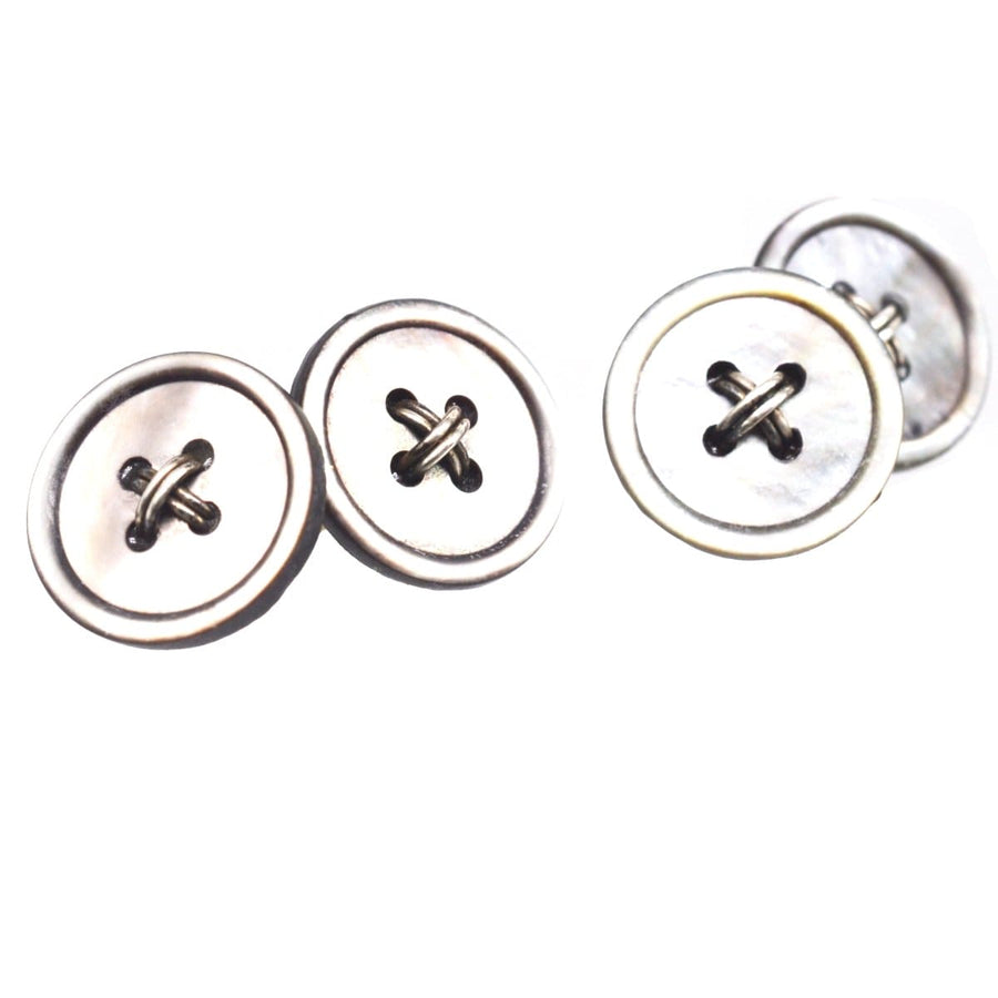 Art Deco Tahitian black mother of pearl button cufflinks, stylish accessory for men and women, adding elegance to outfits.