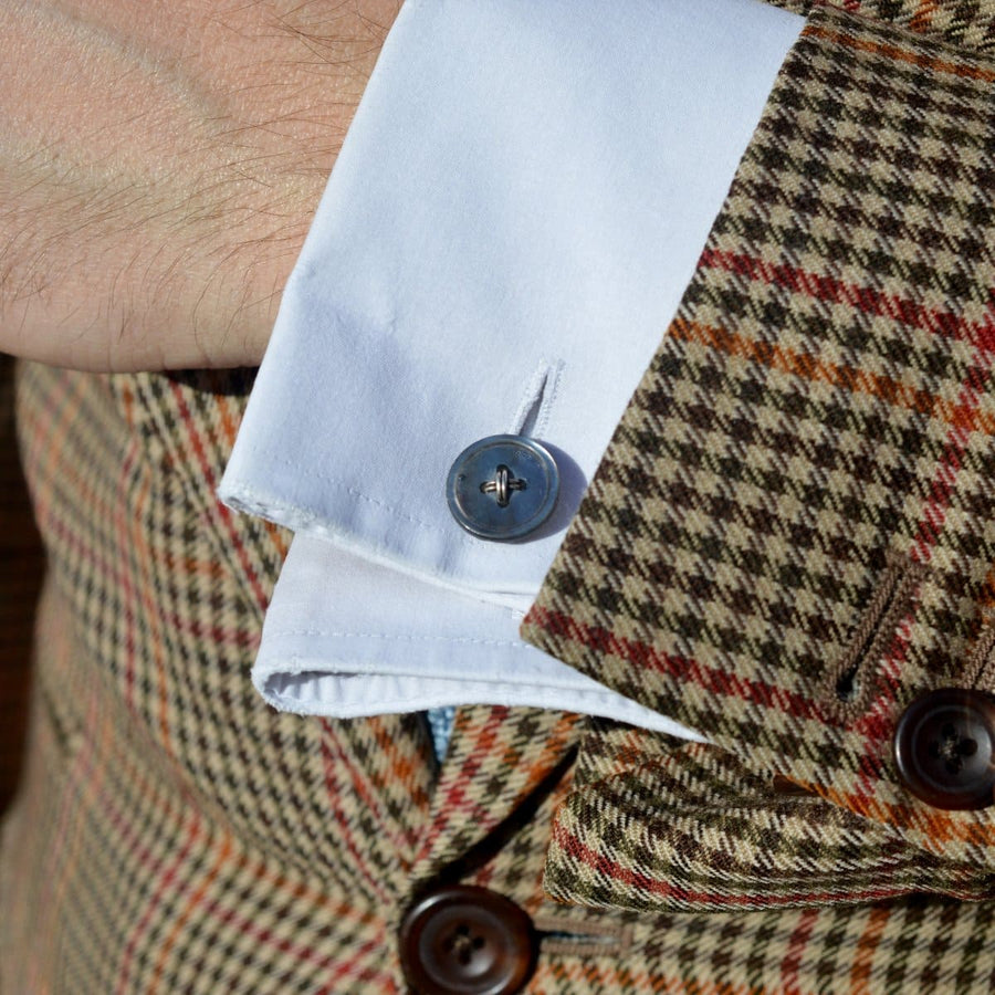 Stylish cufflinks showcased on a dress shirt, emphasizing the elegance of the Art Deco Tahitian Black Mother of Pearl style.