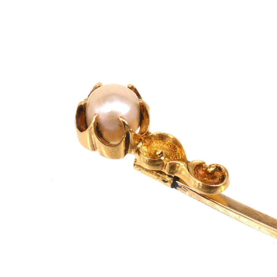 Art Nouveau 15ct Gold Pearl Tie Pin featuring a lustrous pearl and elegant baroque scroll design.