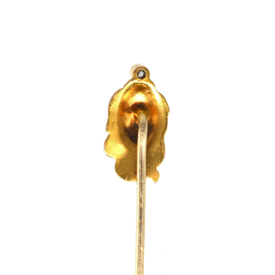 Art Nouveau 15ct gold pin featuring a woman's portrait with a diamond, showcasing sensuous curves and intricate design.
