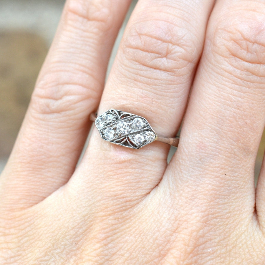 Art Nouveau 18ct white gold and platinum diamond ring with naturalistic design and 0.25 carats of diamonds.
