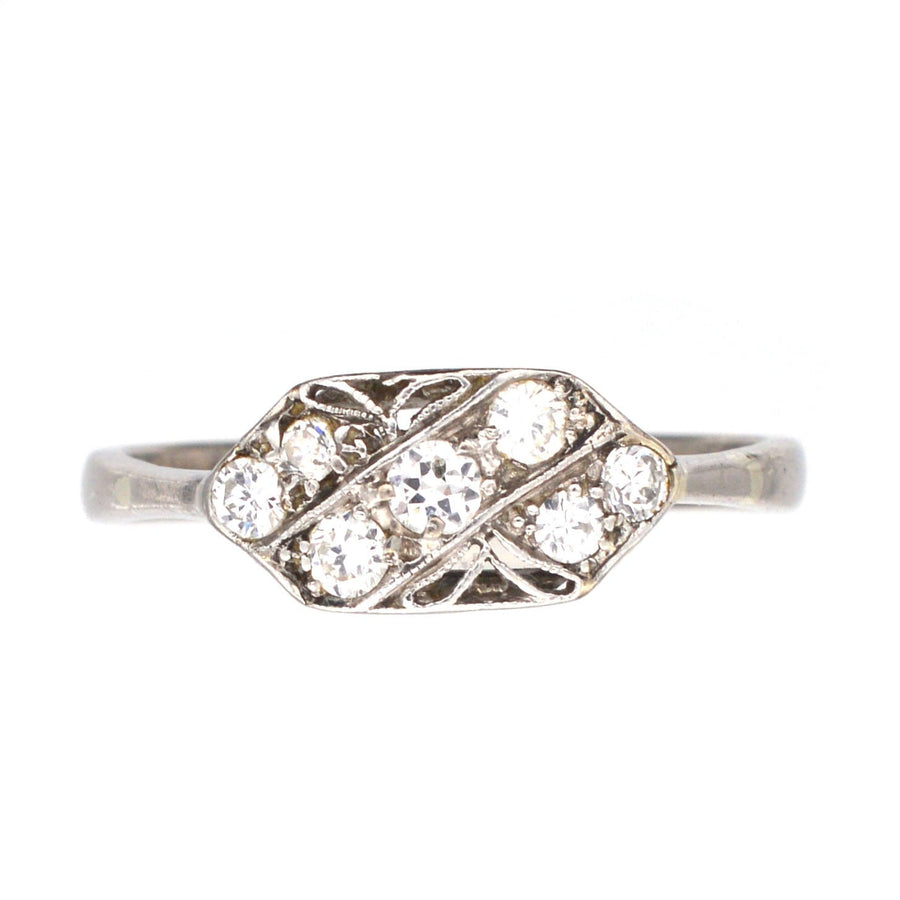 Art Nouveau 18ct white gold and platinum diamond ring with naturalistic design and 0.25 carats of diamonds.