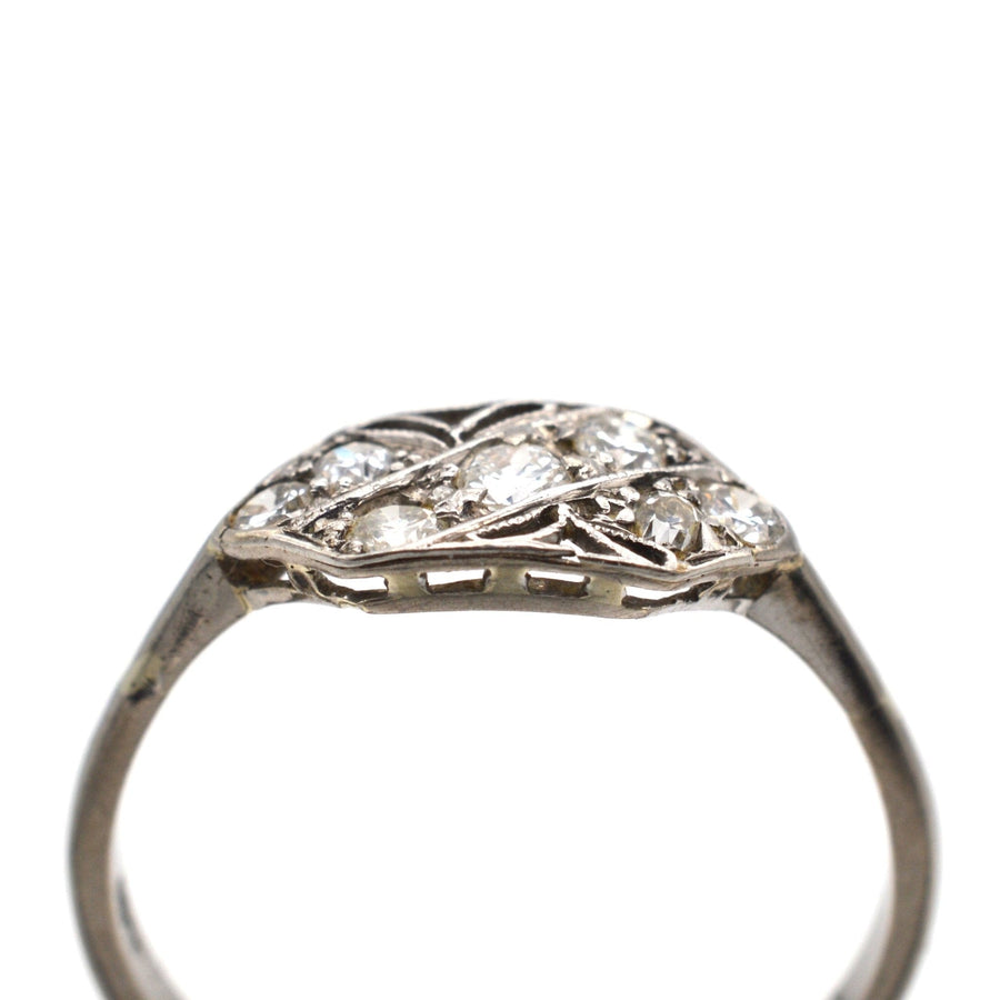 Art Nouveau 18ct white gold and platinum diamond ring with naturalistic design and lace-like detail, circa 1900s.
